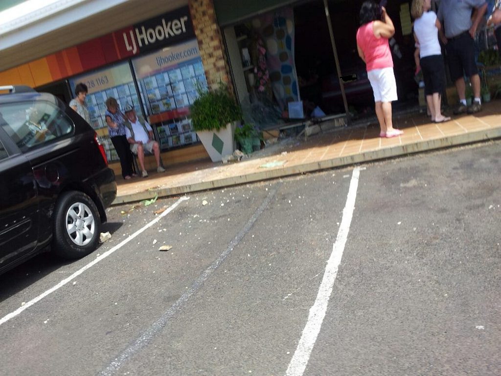 The Alstonville Plaza florist after a car crashed through the shopfront, pinning an 83-year-old woman underneath. The car is just visible inside the shop. Photo contributed. The Alstonville Plaza florist after a car crashed through the shopfront, pinning an 83-year-old woman underneath. The car is just visible inside the shop. Photo contributed.